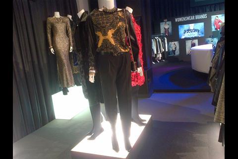 Marks and Spencer tuxedo trousers and contrast leather and silk top